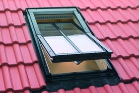 FAKRO conservation roof window on interlocking tiles